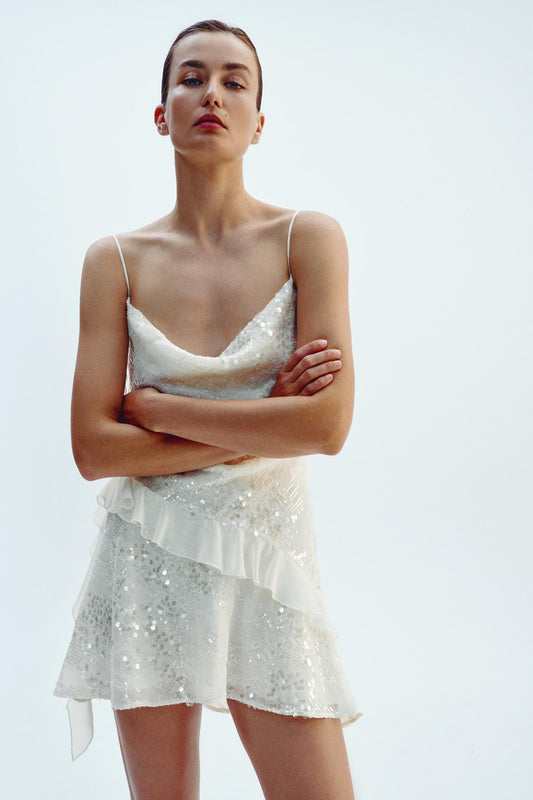 Vestido mini con volantes y lentejuelas